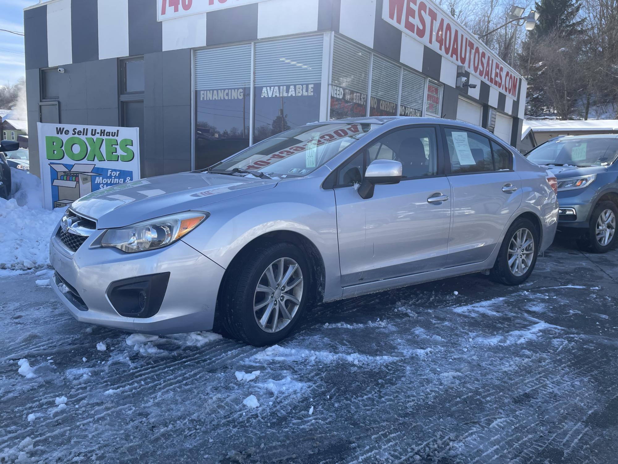 photo of 2014 Subaru Impreza 2.0i Premium 4-Door w/All Weather Package