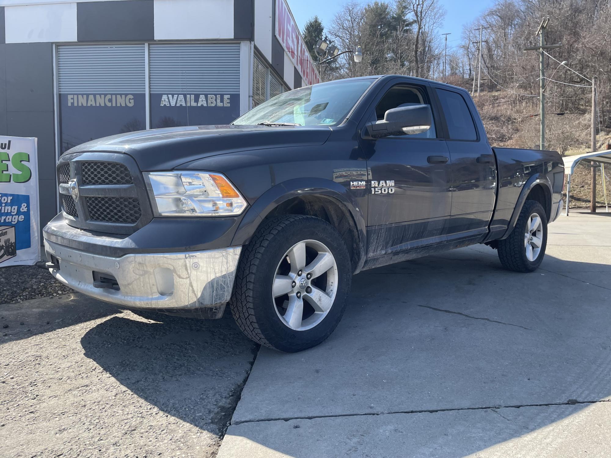 photo of 2015 RAM 1500 SLT Quad Cab 4WD